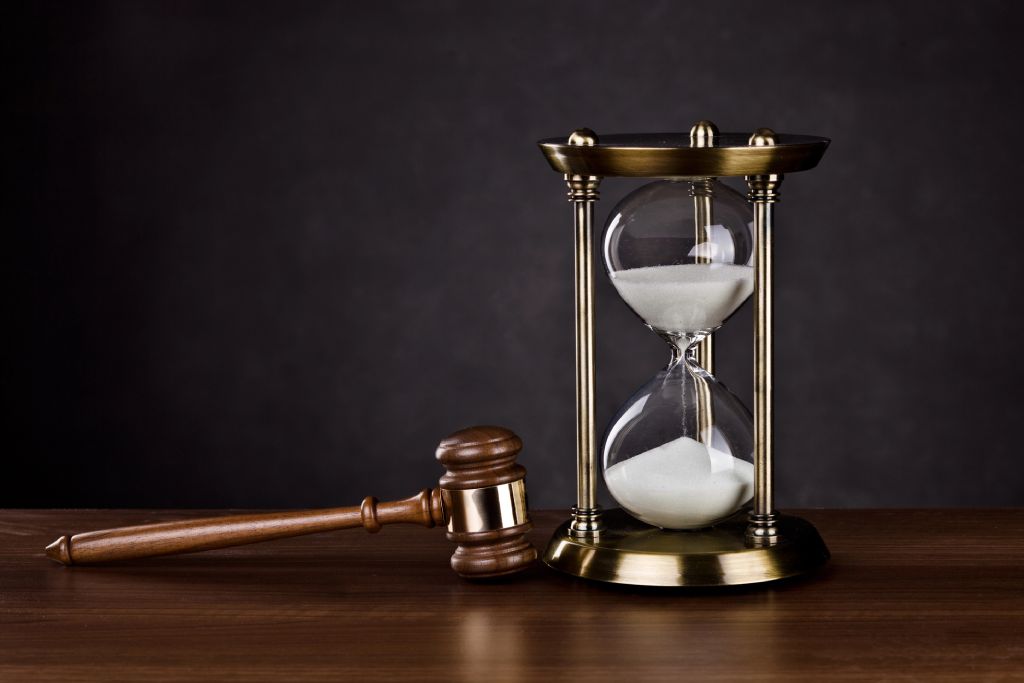 Calendar and judge's gavel Desk calendar and judge's gavel on the desk image