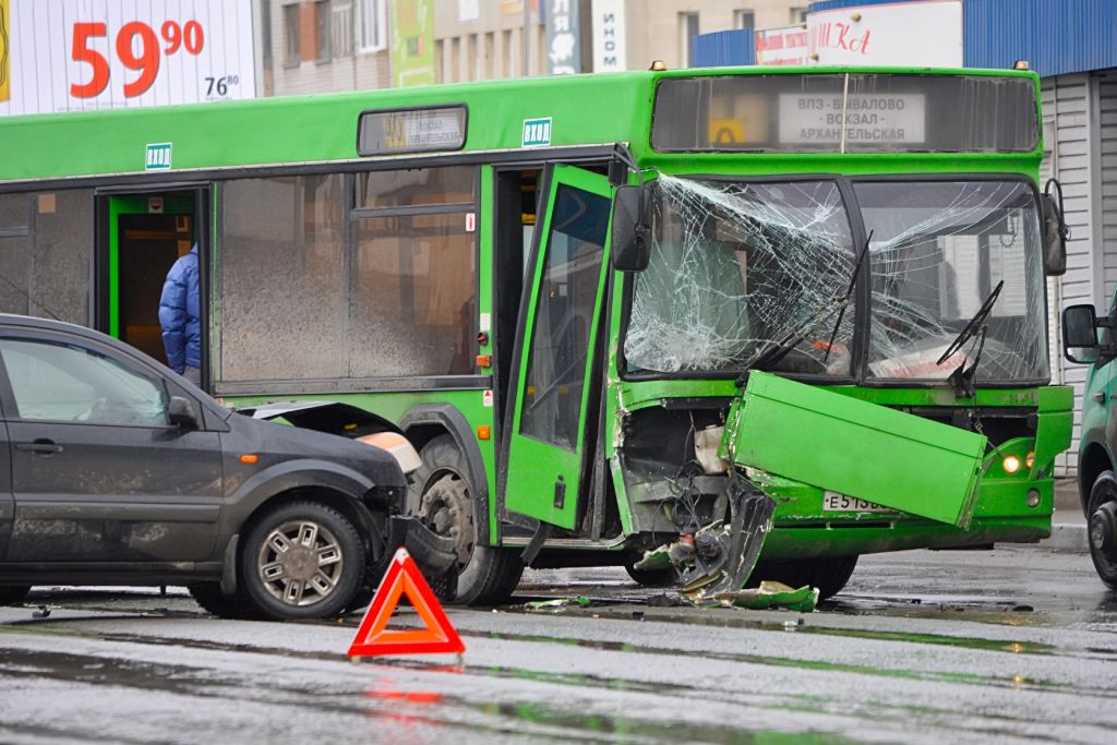 Head-on collision between a car and a bus