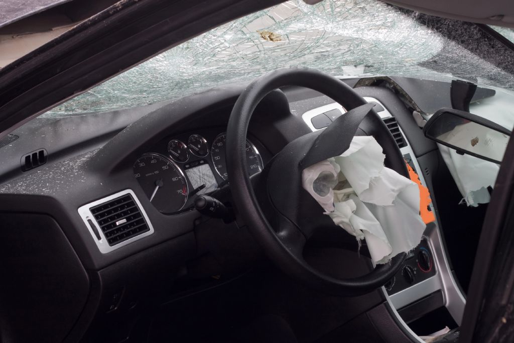 Traffic accident with a wrecked car Traffic accident with a wrecked car