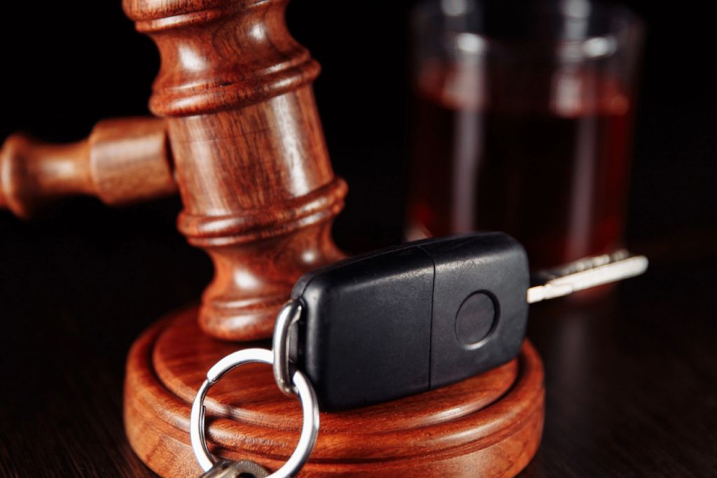 Car and documents and gavel